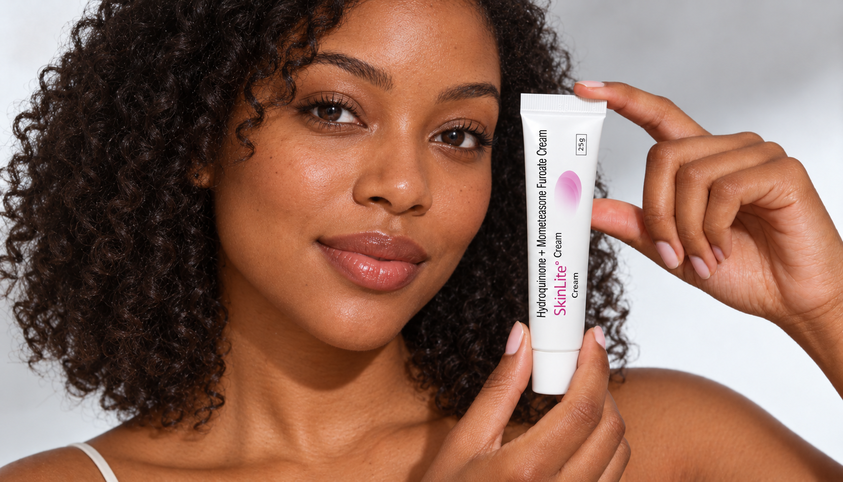 Different model holding The Game Changer Brands SkinLite 25 g cream tube